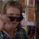 “Nada” (Roddy Piper) finds the infamous sunglasses that expose the truth.